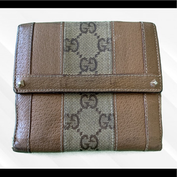 Gucci Handbags - **SOLD**Authentic Gucci Brown Signature GG Bifold Wallet**
